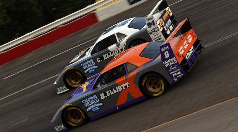 Bill Elliott (No. 9) and Chase Elliott (No. 94) race during a heat race Saturday, July 17, 2021, during the Camping World Superstar Racing Experience event at Nashville Fairgrounds Speedway in Nashville, Tenn. (Mike Arning/True Speed PR)