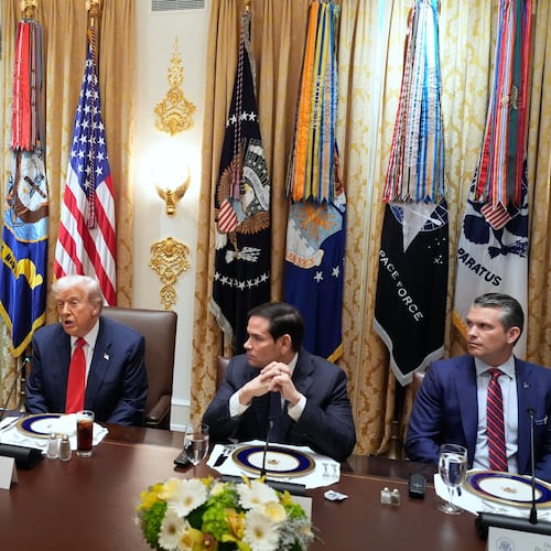 President Donald Trump speaks as he meets with Argentina's President Javier Milei in the Cabinet Room of the White House, Tuesday, Oct. 14, 2025, in Washington, as Treasury Secretary Scott Bessent, Vice President JD Vance, Secretary of State Marco Rubio and Defense Secretary Pete Hegseth listen. (AP Photo/Alex Brandon)