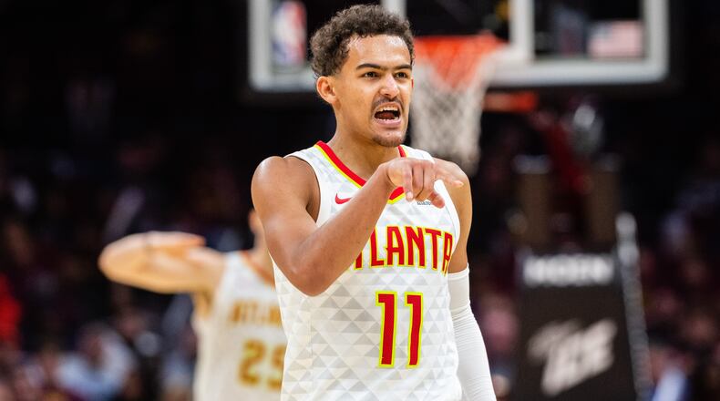 Trae Young of the Atlanta Hawks celebrates after the Hawks scored against the Cleveland Cavaliers during the second half at Quicken Loans Arena on October 21, 2018 in Cleveland, Ohio. The Hawks defeated the Cavaliers 133-111. NOTE TO USER: User expressly acknowledges and agrees that, by downloading and/or using this photograph, user is consenting to the terms and conditions of the Getty Images License Agreement. (Photo by Jason Miller/Getty Images)