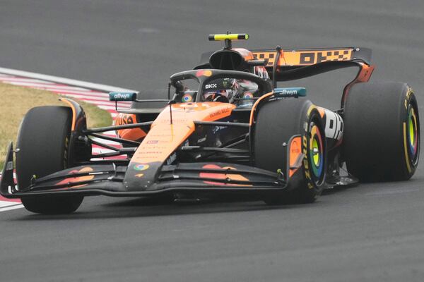 McLaren driver Lando Norris of Britain steers his car during the Japanese Formula One Grand Prix at the Suzuka Circuit in Suzuka, central Japan, Sunday, April 6, 2025. (AP Photo/Hiro Komae)