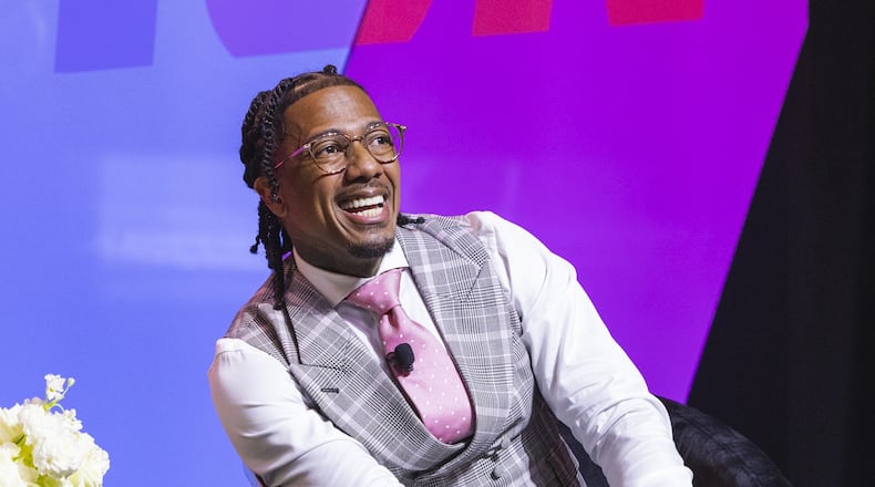 Nick Cannon smiles during an appearance at the Black Enterprise Disruptor Summit in Atlanta on May 18, 2024.