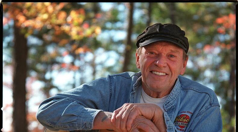 In this photo from 2007 Chips Moman poses with his guitar in his back yard in LaGrange, Ga. File photo