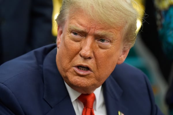 President Donald Trump answers questions from reporters as he meets with Congo's Foreign Minister Therese Kayikwamba Wagner, and Rwanda's Foreign Minister Olivier Nduhungirehe, Friday, June 27, 2025, in the Oval Office at the White House in Washington. (AP Photo/Manuel Balce Ceneta)