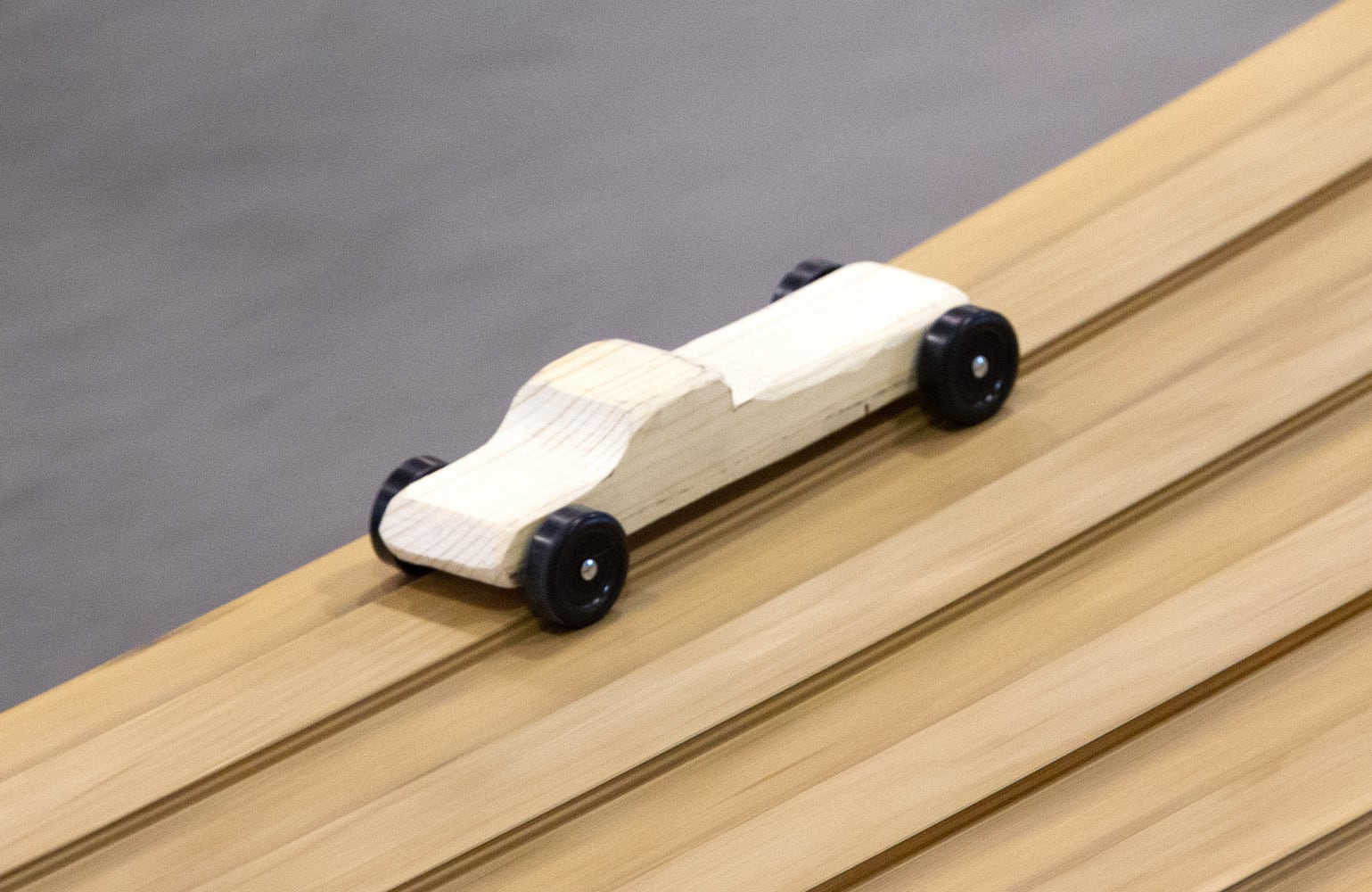 Cub Scouts building pinewood derby cars