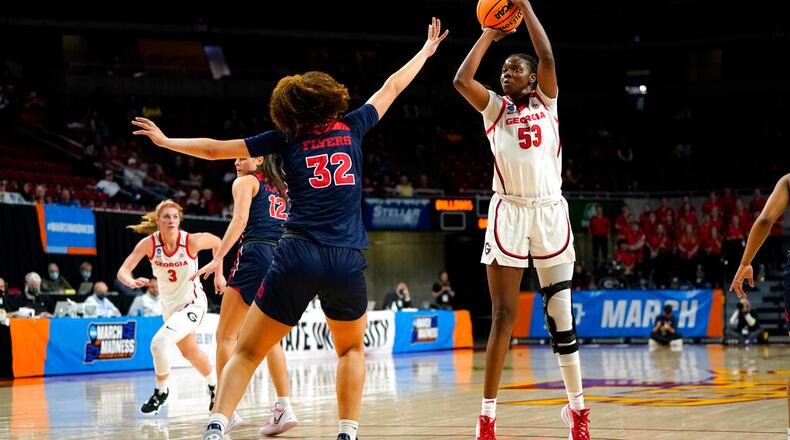 Georgia forward Jillian Hollingshead (53) shoots over Dayton forward Brynn Shoup-Hill (32) during the first half of a first round game in the NCAA women's college basketball tournament, Friday, March 18, 2022, in Ames, Iowa. (AP Photo/Charlie Neibergall)