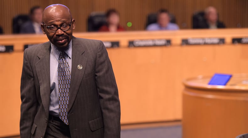 Gabe Okoye, chairman of the Gwinnett County Democratic Party, walks away from the podium after telling the Gwinnett Board of Commissioners that the election to determine the approval of a new contract with MARTA should be held in the upcoming November election instead of being delayed until 2019 on Wednesday, August 1 at the Gwinnett Justice and Administration Center auditorium. JENNA EASON / JENNA.EASON@COXINC.COM