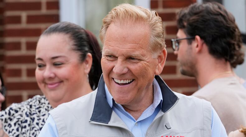 Republican nominee for U.S. Senate Mike Rogers smiles during a campaign event Thursday, Aug. 20, 2026, in Detroit. (AP Photo/Paul Sancya)