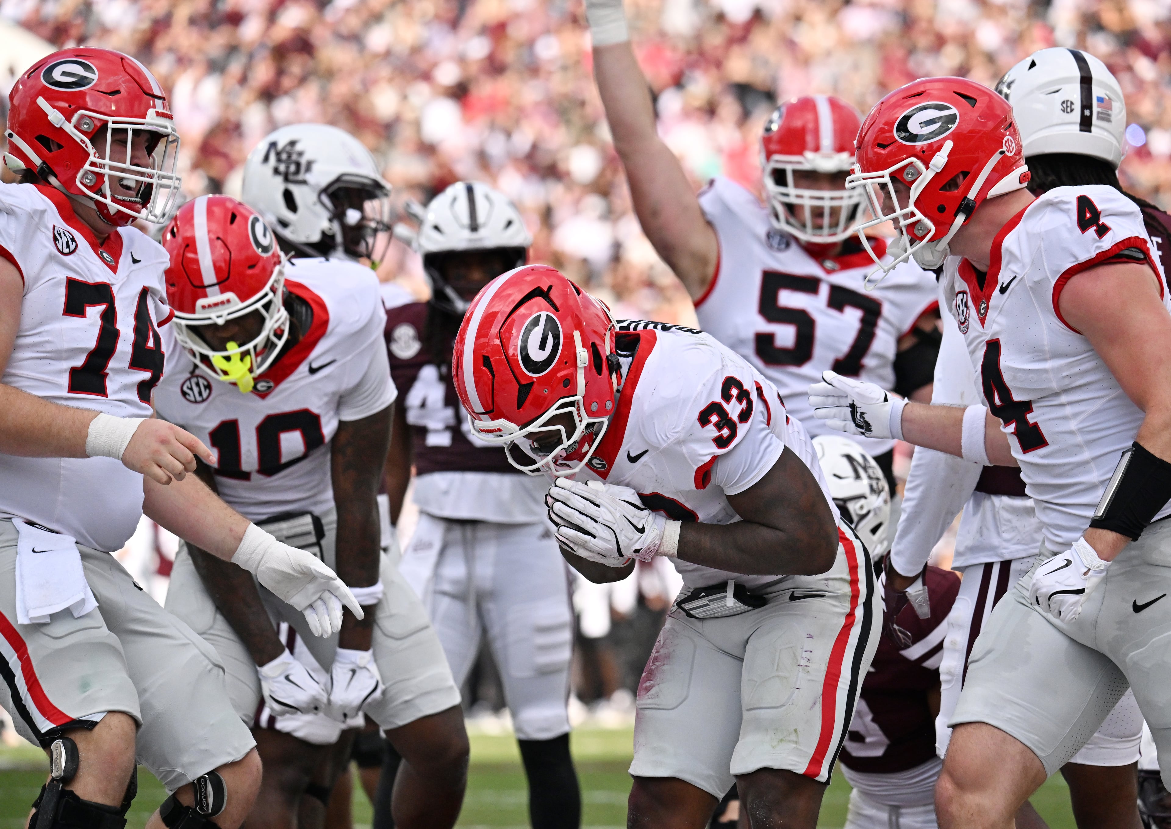 Georgia running back Chauncey Bowens (33) celebrates after scoring a touchdown during the first half in an NCAA football game at Davis Wade Stadium, Saturday, November 8, 2025, in Starkville, Mississippi. (Hyosub Shin / AJC)