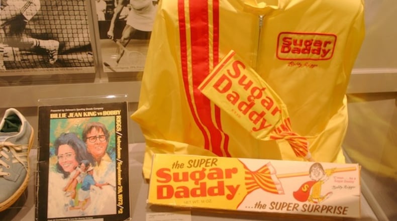 Among memorabilia from the 1973 Billie Jean King/ Bobby Riggs tennis match is Riggs' warmup jacket from his sponsor, Sugar Daddy candy maker. (Handout/TNS)