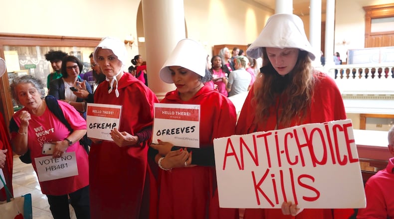 Protesters rally outside a Georgia Senate hearing on an anti-abortion measure. AJC/Bob Andres.