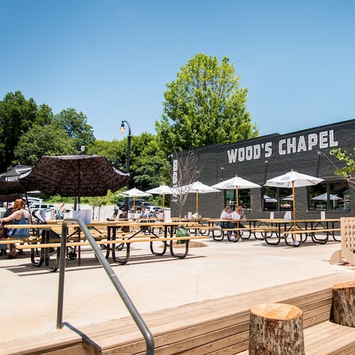 Wood's Chapel BBQ exterior and patio. The restaurant is revamping its menu toward Tex-Mex to keep prices down. (Mia Yakel/Courtesy of Wood's Chapel BBQ).