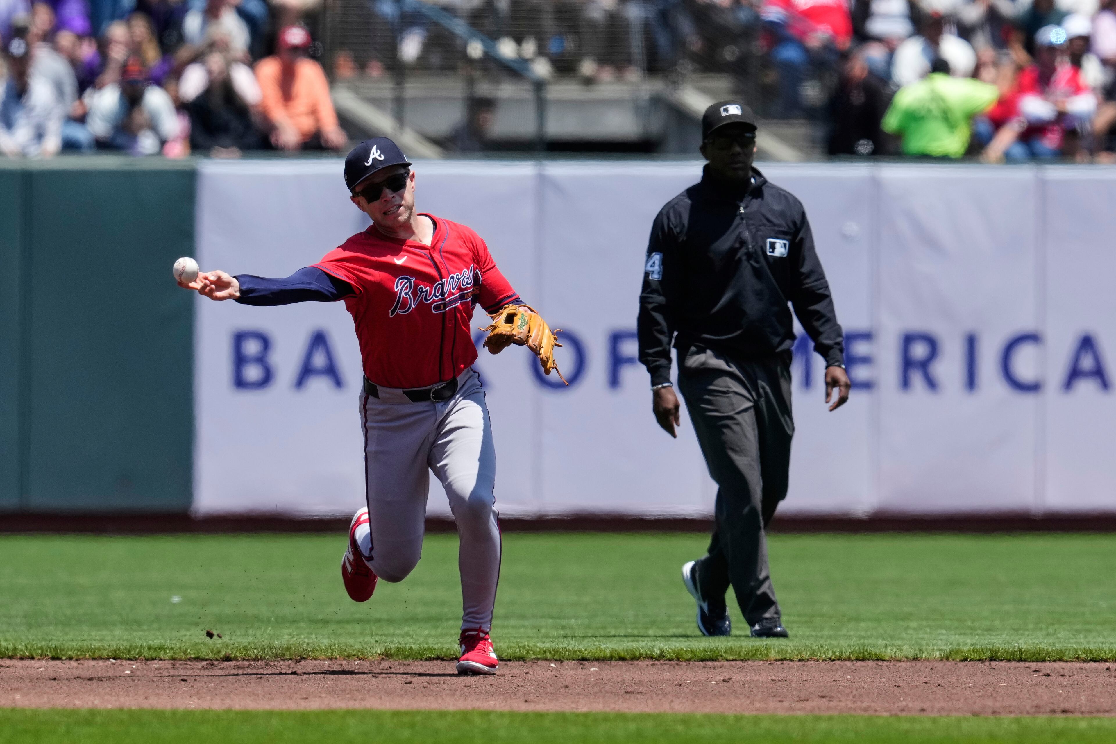 Atlanta Braves shortstop Nick Allen throws to first for an out on San Francisco Giants' Wilmer Flores during the first inning of a baseball game Saturday, June 7, 2025, in San Francisco. (AP Photo/Godofredo A. Vásquez)