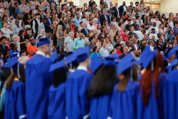 Families and students gather at Kennesaw State Convocation Center for Campbell High School graduation. (Natrice Miller/AJC 2023) 