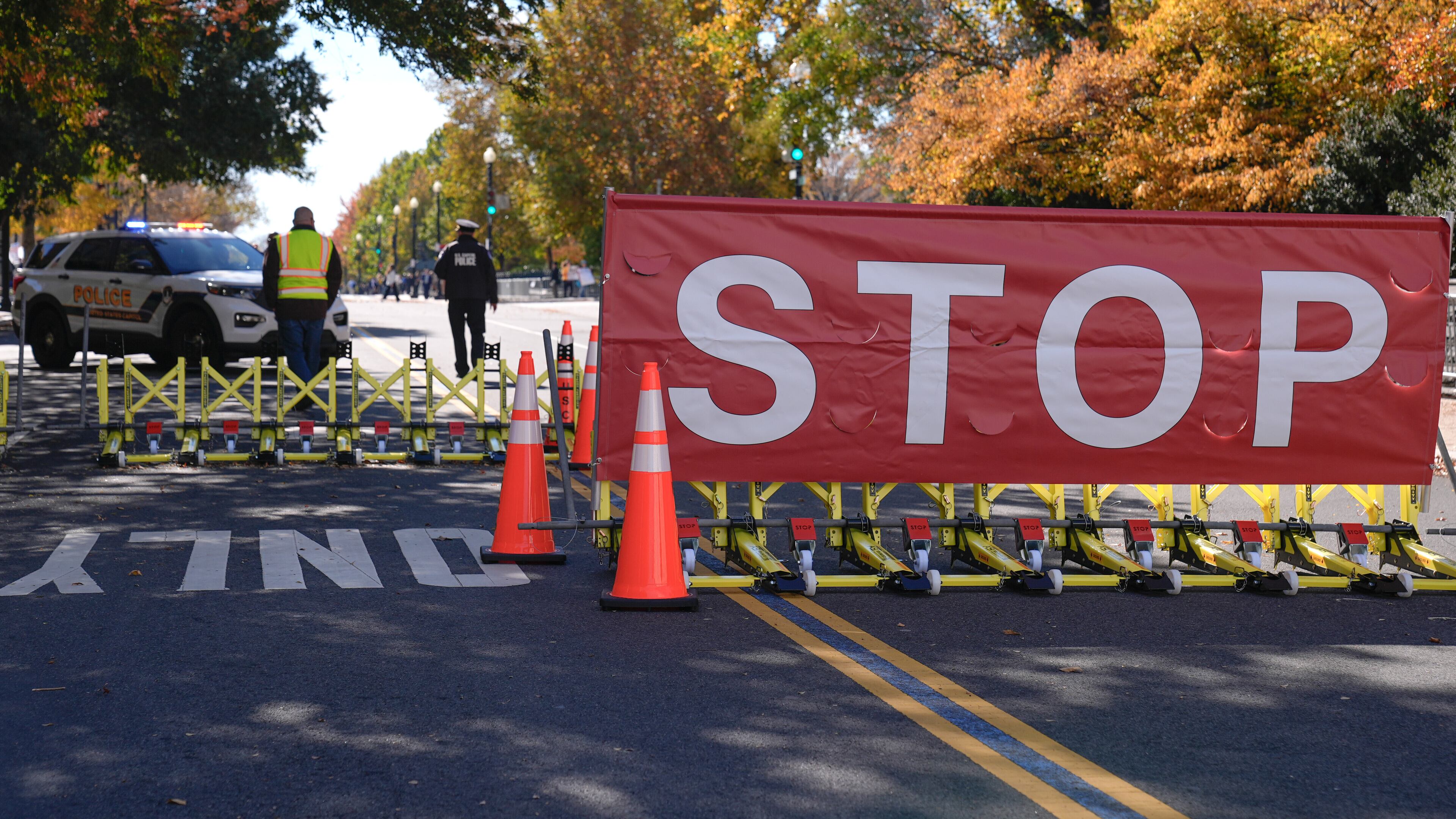 The roadway in front of the Supreme Court and U.S. Capitol is closed to traffic on the 36th day of the government shutdown on Capitol Hill, Wednesday, Nov. 5, 2025, in Washington. (AP Photo/Mariam Zuhaib)