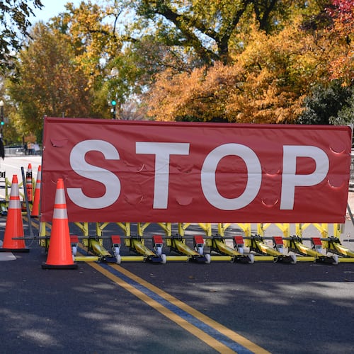 The roadway in front of the Supreme Court and U.S. Capitol is closed to traffic on the 36th day of the government shutdown on Capitol Hill, Wednesday, Nov. 5, 2025, in Washington. (AP Photo/Mariam Zuhaib)