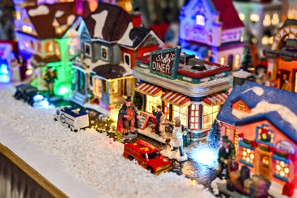 Don Mathis's first purchase for his Christmas model train display was a diner. (Sarah Peacock for the AJC)