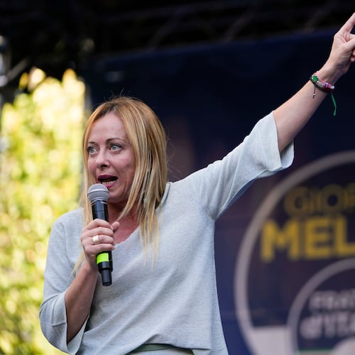FILE - Right-wing party Brothers of Italy's leader Giorgia Meloni addresses a rally as she starts her political campaign ahead of the Sept. 25 general elections, in Ancona, Italy, Tuesday, Aug. 23, 2022. (AP Photo/Domenico Stinellis, File)