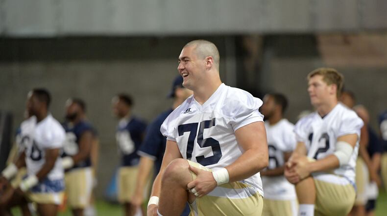 August 4, 2017 Atlanta - Georgia Tech offensive lineman Parker Braun (75) warms up during the first day of Georgia Tech football practice at Rose Bowl Field in Georgia Tech campus on Friday, August 4, 2017. HYOSUB SHIN / HSHIN@AJC.COM