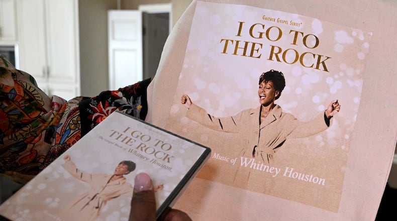 Pat Houston, Whitney Houston’s sister-in-law, holds Whitney Houston's new gospel album at her home, Saturday, March 25, 2023, in Alpharetta. Whitney Houston's estate releases a new album 11 years after the singer's death. (Hyosub Shin / Hyosub.Shin@ajc.com)