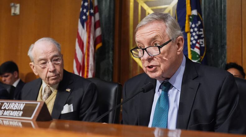 FILE - Sen. Dick Durbin, D-Ill., speaks as Chairman of the Senate Judiciary Committee, Sen. Chuck Grassley, R-Iowa, listens during an oversight hearing at the Capitol in Washington, Tuesday, March 3, 2026. (AP Photo/J. Scott Applewhite, File)