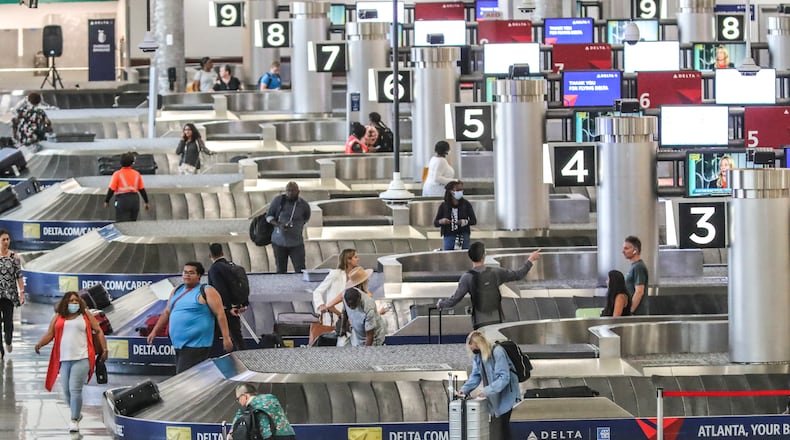Hartsfield-Jackson International Airport: on Wednesday, June 29, 2022 at Hartsfield-Jackson International Airport , where many travelers were expected over the Fourth of July holiday travel period.  (John Spink / John.Spink@ajc.com)
