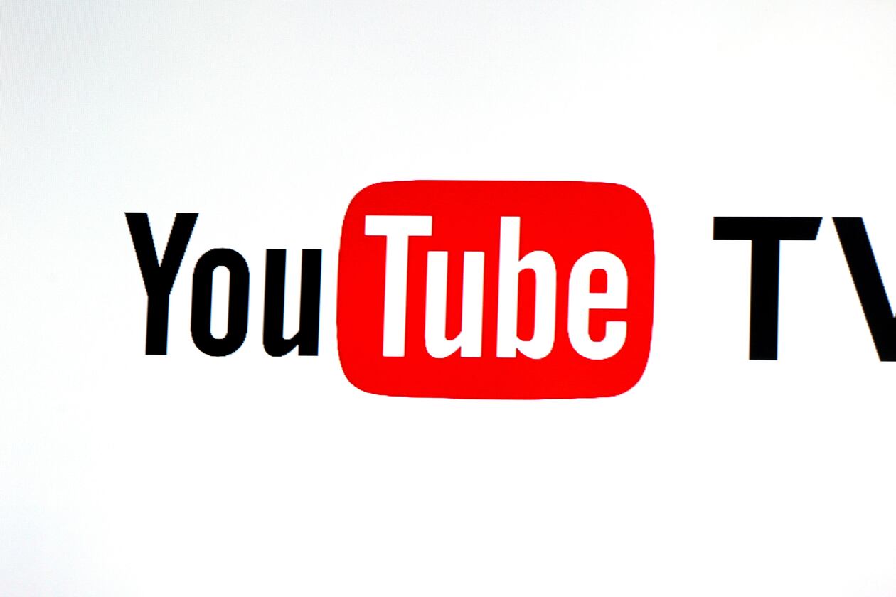 FILE - This Tuesday, Feb. 28, 2017, file photo shows the YouTube TV logo at the YouTube Space LA in Los Angeles. T (AP Photo/Reed Saxon, File)