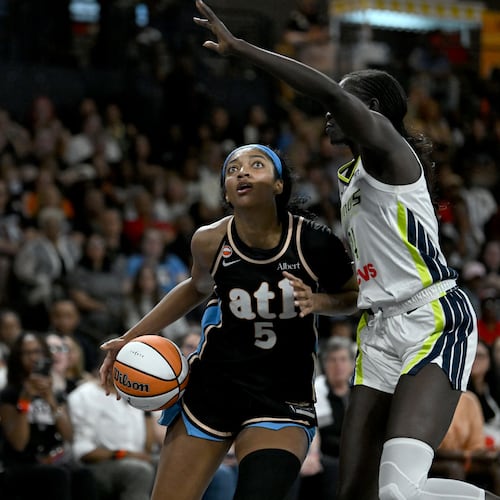 Atlanta Dream forward Angel Reese drives against the Dallas Wings in May. In Thursday's game against the Liberty, Reese scored a season high 25 points. (Hyosub Shin/AJC)
