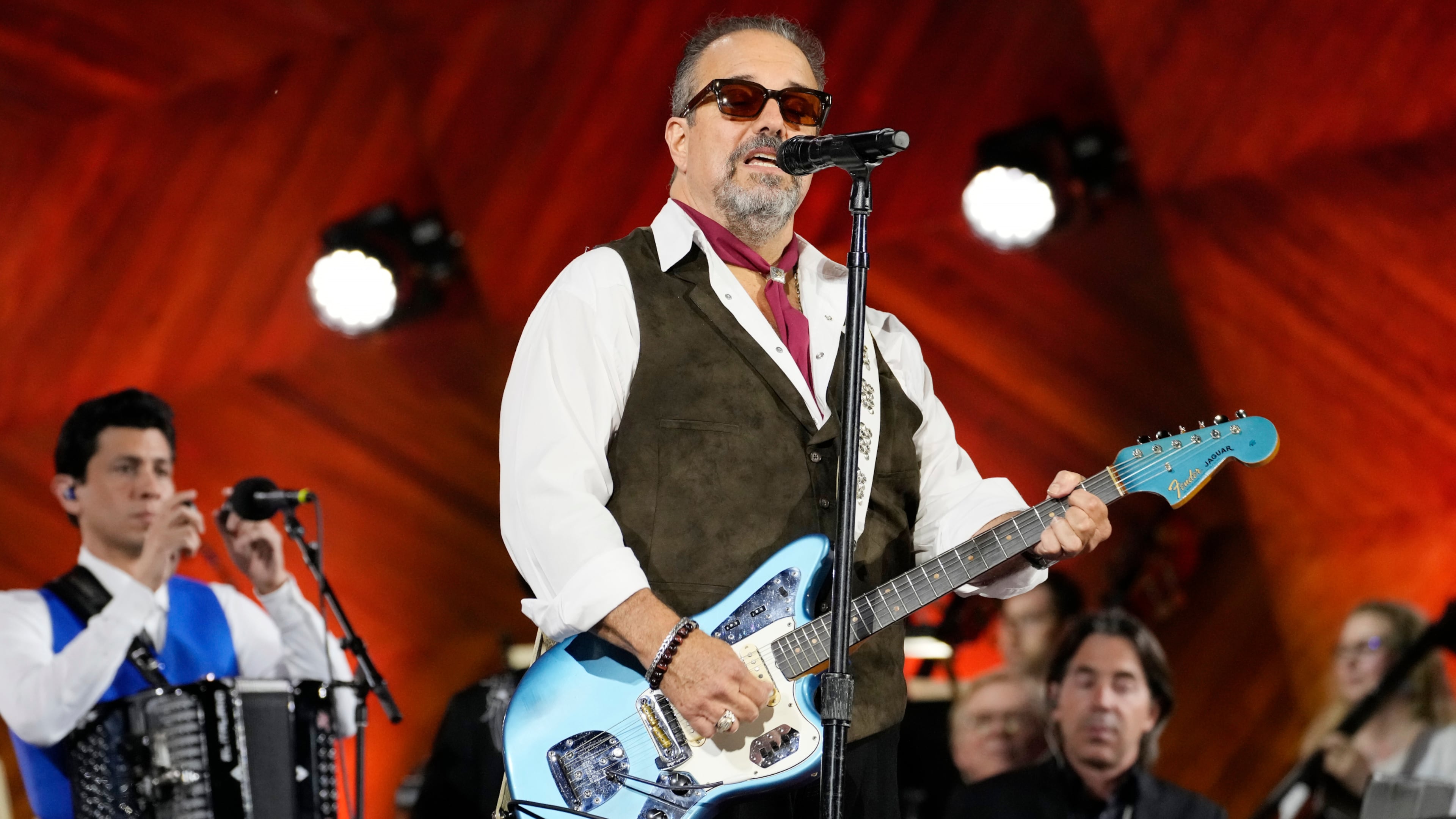 FILE - Frontman Raul Malo, center, and The Mavericks perform during the Boston Pops Fireworks Spectacular in Boston on July 4, 2024. (AP Photo/Michael Dwyer, File)