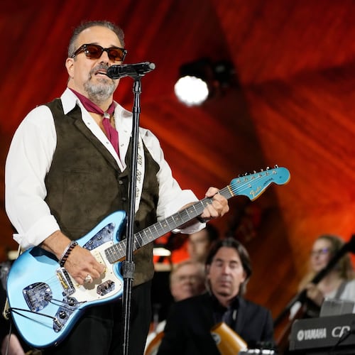 FILE - Frontman Raul Malo, center, and The Mavericks perform during the Boston Pops Fireworks Spectacular in Boston on July 4, 2024. (AP Photo/Michael Dwyer, File)