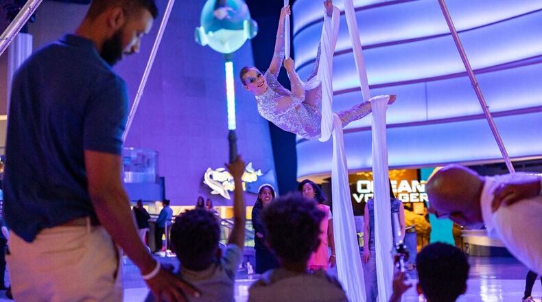 Glow Nights return to the Georgia Aquarium with glowing scenes, cirque-style performances and other experiences. Friday through Sunday, June 5-7 (and continuing through Sunday, Aug. 9). (Courtesy of the Georgia Aquarium)