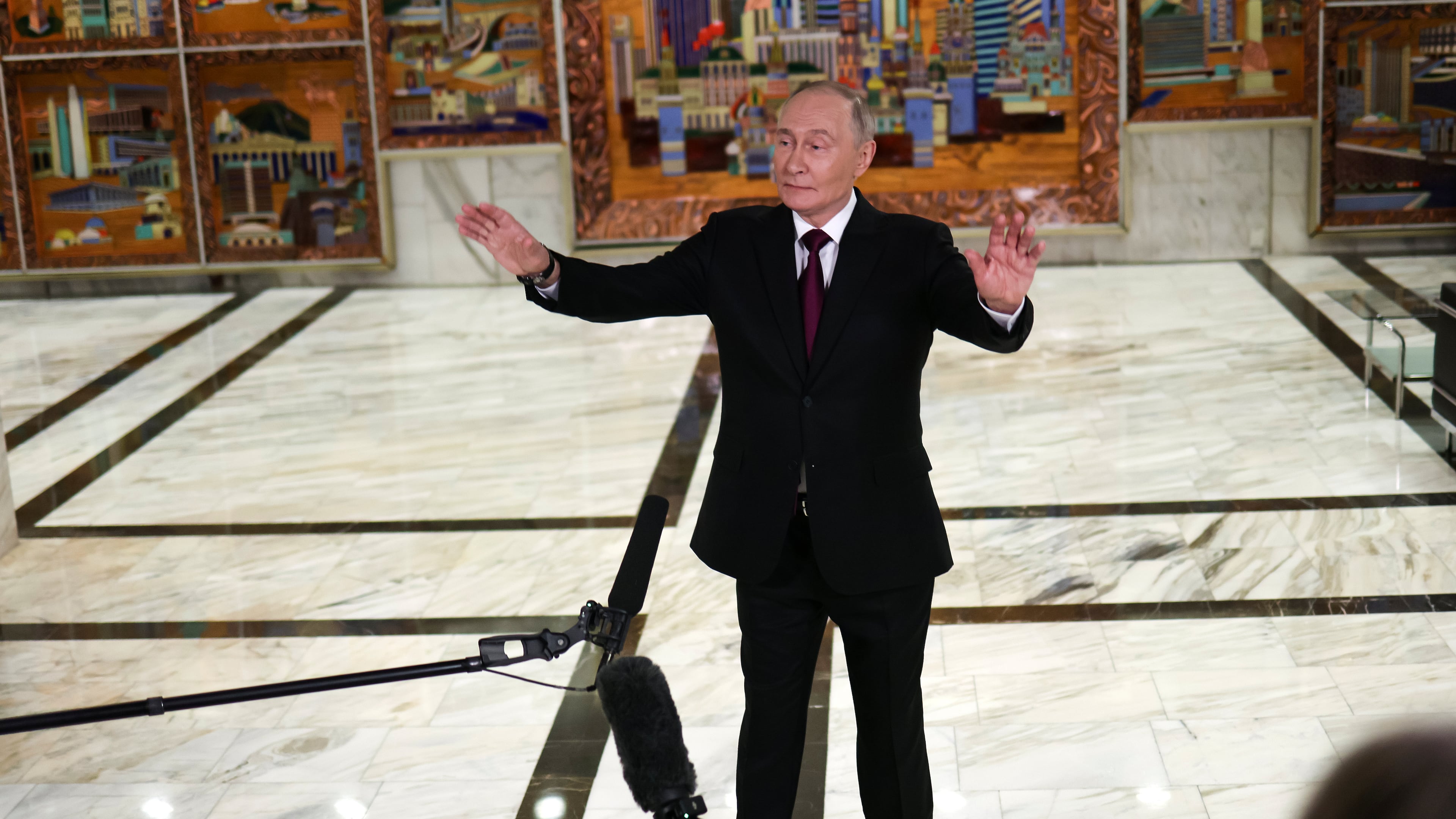 Russian President Vladimir Putin gestures speaking to journalists after the plenary session of the VTB "Russia Calling" Investment forum in Moscow, Tuesday, Dec. 2, 2025. (Sergei Ilnitsky/Pool Photo via AP)