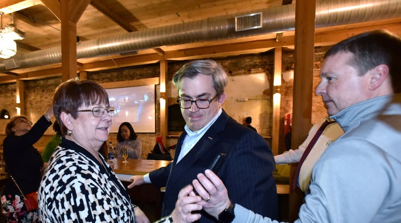 Charlotte Nash (left), Chairman of the Gwinnett County Board of Commissioners, reacts after she found out Gwinnett County’s MARTA referendum failed during an election night watch party. Metro Atlanta officials say the failure shouldn’t deter other counties from expanding transit. But they draw different lessons from the Gwinnett results. HYOSUB SHIN / HSHIN@AJC.COM