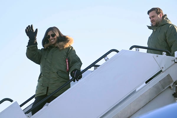 Vice President JD Vance, right, and second lady Usha Vance arrive at Pituffik Space Base in Greenland, Friday, March 28, 2025. (Jim Watson/Pool via AP)