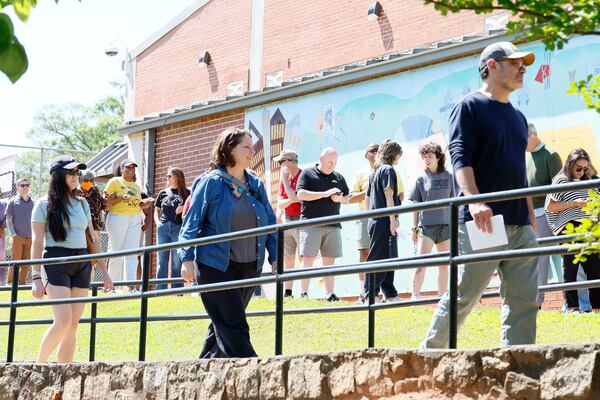 People wait in line at Bessie Branham Park in Kirkwood last week during the final day of early voting before Georgia’s midterm primary elections. (Miguel Martinez/AJC)