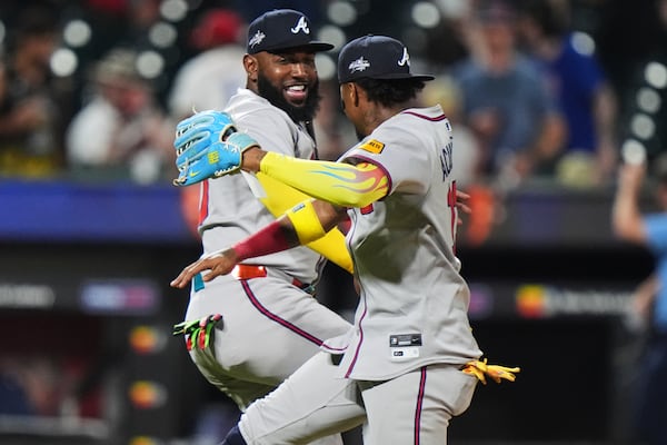 Atlanta Braves' Marcell Ozuna, left, celebrates with Ronald Acuña after a baseball game against the New York Mets Tuesday, June 24, 2025, in New York. (AP Photo/Frank Franklin II)