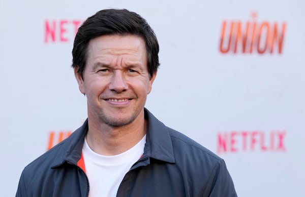 FILE - Mark Wahlberg, a cast member in "The Union," poses at the premiere of the Netflix film at the Egyptian Theatre, Monday, Aug. 12, 2024, in Los Angeles. (AP Photo/Chris Pizzello, file)