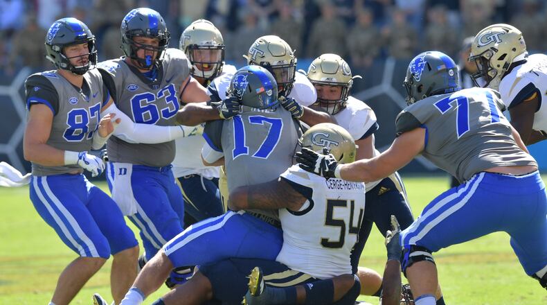 October 13, 2018 Atlanta - Duke quarterback Daniel Jones (17) is brought by Georgia Tech defensive lineman Kyle Cerge-Henderson (54) in the first half at Bobby Dodd Stadium on October 13, 2018. HYOSUB SHIN / HSHIN@AJC.COM