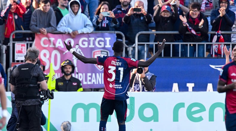 Cagliari's Paul Mendy celebrates after scoring during the Serie A soccer match between Cagliari and Atalanta, in Cagliari, Italy, Monday, April 27. (Gianluca Zuddas/LaPresse via AP)