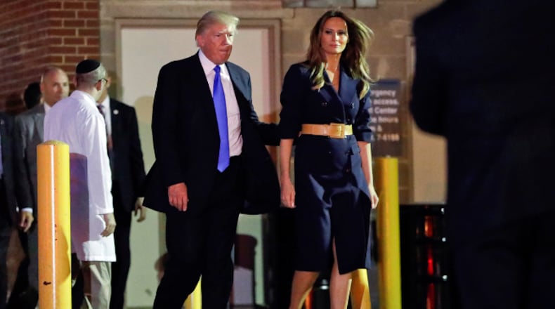 President Donald Trump and first lady Melania Trump walk to their vehicle after visiting MedStar Washington Hospital Center in Washington, Wednesday, June 14, 2017, where House Majority Leader Steve Scalise of La. was taken after being shot in Alexandria, Va., during a Congressional baseball practice. (AP Photo/Pablo Martinez Monsivais)