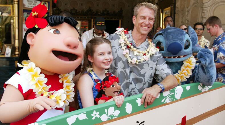 FILE PHOTO: Daveigh Chase, voice of Lilo, and Chris Sanders, writer/director/voice of Stitch, at the premiere and after-party for 'Lilo & Stitch' at the El Capitan Theatre in Los Angeles, Ca. Sunday, June 16, 2002. The Hollywood Reporter says that "Lilo and Stitch" will be Disney's latest live-action movie.