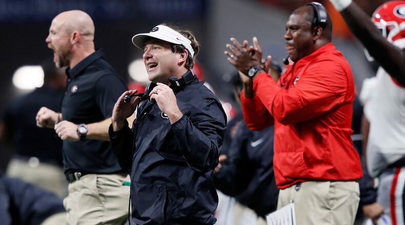 ATLANTA, GA - DECEMBER 02: Head coach Kirby Smart of the Georgia Bulldogs reacts to a play during the first half against the Auburn Tigers in the SEC Championship at Mercedes-Benz Stadium on December 2, 2017 in Atlanta, Georgia. (Photo by Jamie Squire/Getty Images)