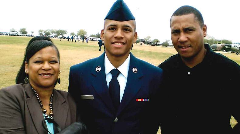 Anthony Hill and his parents - Anthony Hill Sr. and Carolyn Baylor-Giummo
