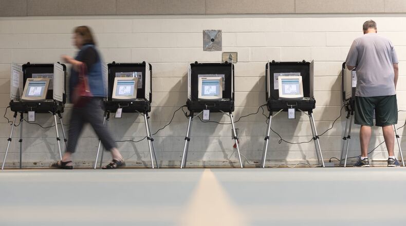 Voters cast their ballots at Mt. Zion United Methodist Church in Marietta, Georgia, on Tuesday, April 18, 2017. Cobb, Fulton and North DeKalb residents cast ballots today for the highly contested 6th Congressional District race. (DAVID BARNES / DAVID.BARNES@AJC.COM)