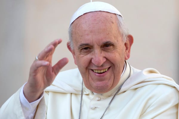 FILE - Pope Francis delivers his blessing as he arrives to hold his weekly general audience, in St. Peter's Square, at the Vatican, Wednesday, Sept. 17, 2014. (AP Photo/Andrew Medichini, File)