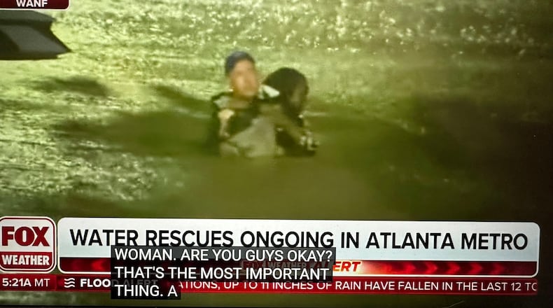 Fox Weather meteorologist Bob Van Dillen saved a woman in Buckhead Friday morning from her submerged car. FOX WEATHER