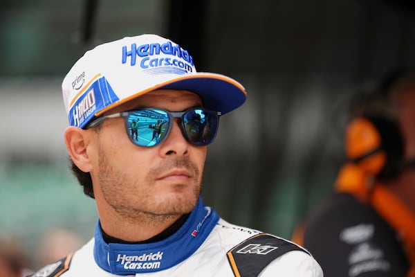 Kyle Larson waits for the start of practice for the Indianapolis 500 auto race at Indianapolis Motor Speedway in Indianapolis, Wednesday, May 14, 2025. (AP Photo/Michael Conroy)