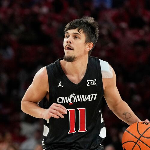 FILE - Cincinnati guard Kerr Kriisa (11) handles the ball during the first half of an NCAA college basketball game against Houston, Saturday, Jan. 31, 2026, in Houston. (AP Photo/Kevin M. Cox, File)
