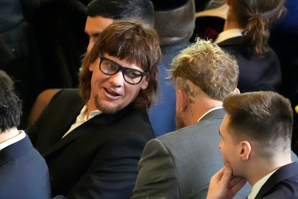 FILE - Theo Von, left speaks with Jake Paul in Emancipation Hall at the 60th Presidential Inauguration, Jan. 20, 2025, at the U.S. Capitol in Washington. (Jasper Colt/Pool Photo via AP, File)