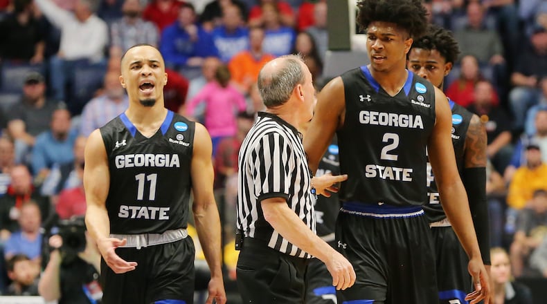 Isaiah Williams (left) and Malik Benlevi of the Georgia State Panthers react to a call during Friday's NCAA tournament opener against Cincinnati. Georgia State, the Sun Belt Conference champion and a No. 15 seed in the South Region, was eliminated after its 68-53 loss to the No. 2 seeded Bearcats. (Frederick Breedon/Getty Images)
