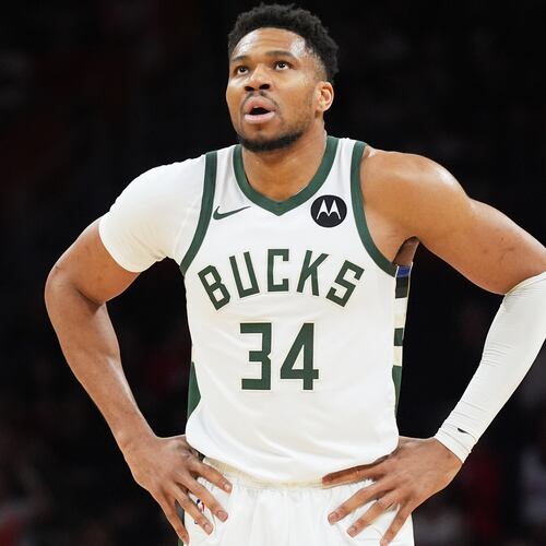 Milwaukee Bucks forward Giannis Antetokounmpo (34) looks up at the score board during the first half of an NBA basketball game against the Miami Heat Thursday, March 12, 2026, in Miami. (AP Photo/Marta Lavandier)